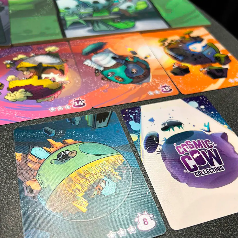 Cosmic Cow Collectors (Es) Juego abierto, cartas protegidas